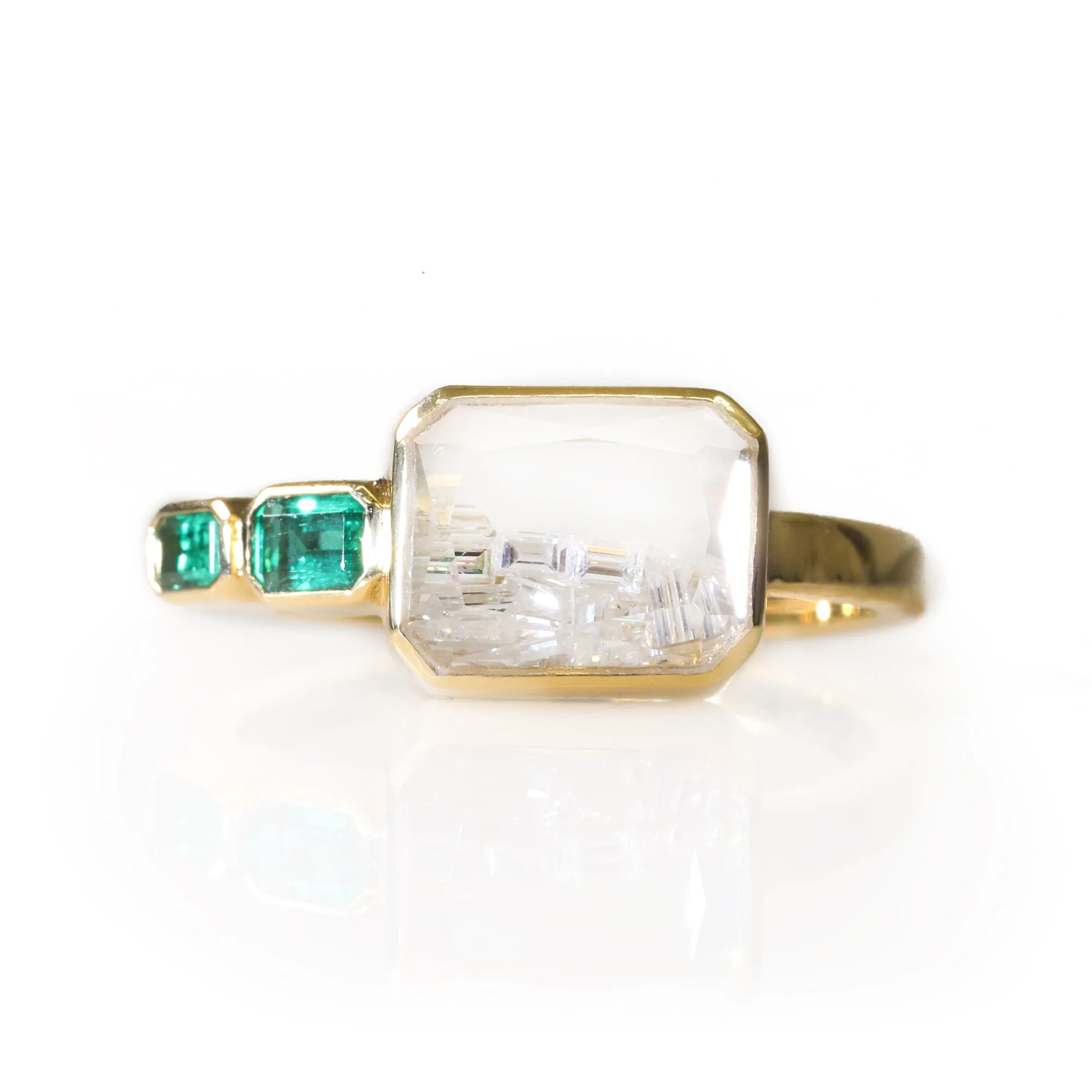 Gold Ring with Diamond Shake and Emerald Baguette Details